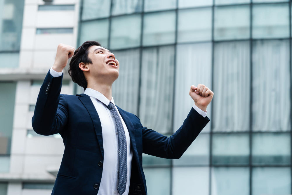 articles/image-of-young-asian-businessman-with-glass-building-background.jpg